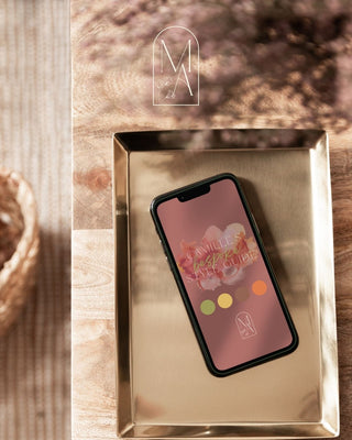 Digital personal styling guide displayed on a smartphone featuring colour palette recommendations from Mylène Amelie Styling Services, representing the personalized style guides clients receive after colour analysis and styling consultations.